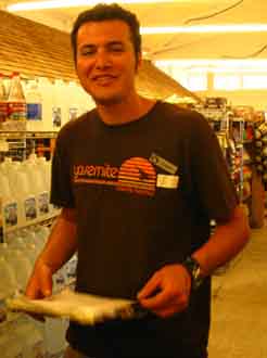 Jamie keeping the shelves full at the Tuolumne Meadows Store.